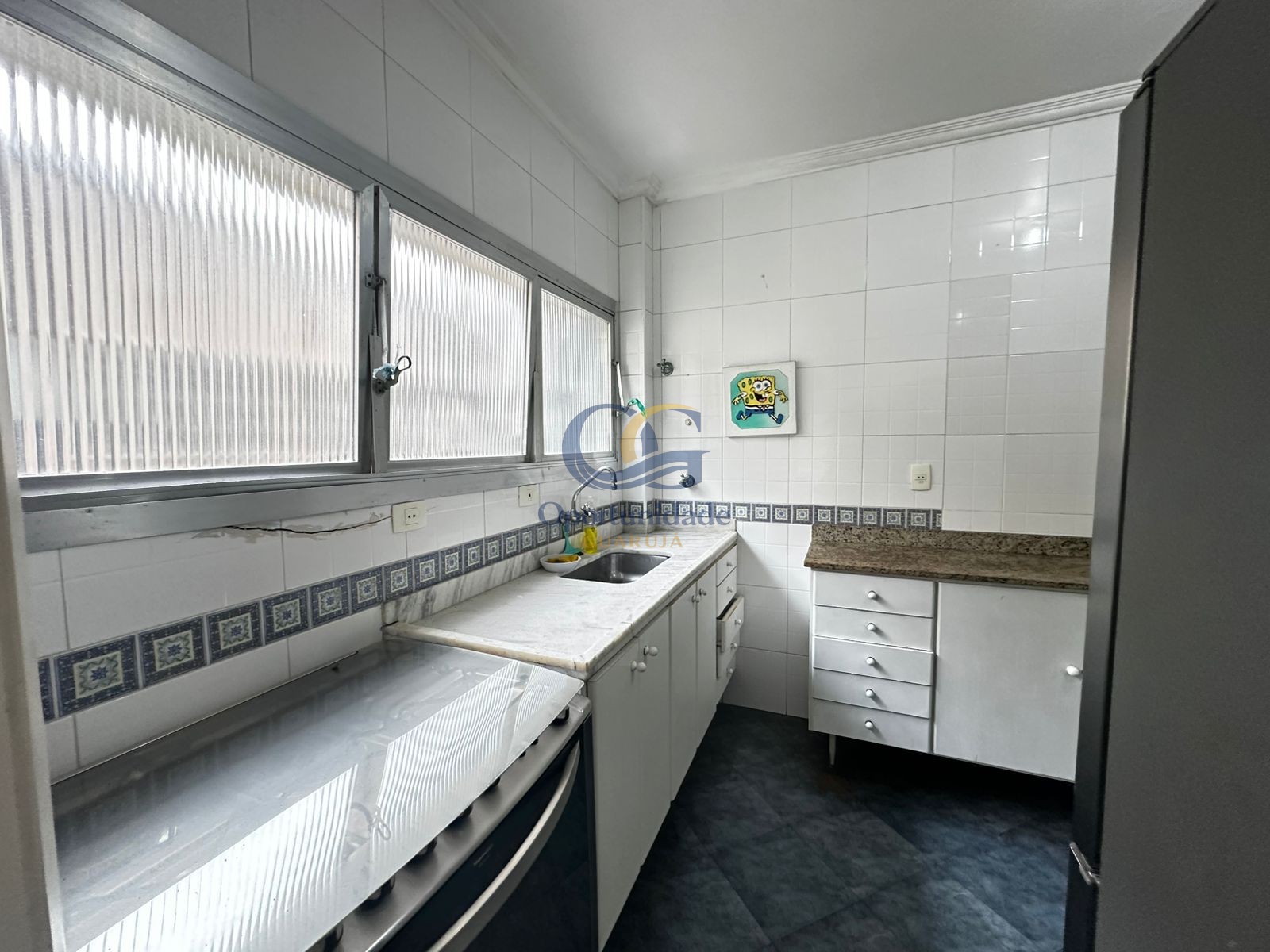 Apartamento na Praia das Pitangueiras, Guarujá - SP