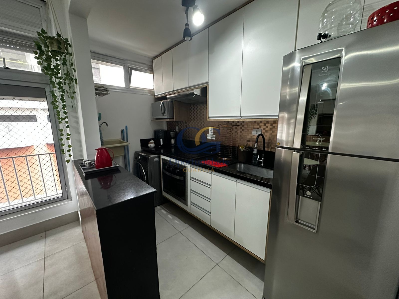 Apartamento na Praia das Pitangueiras, Guarujá - SP