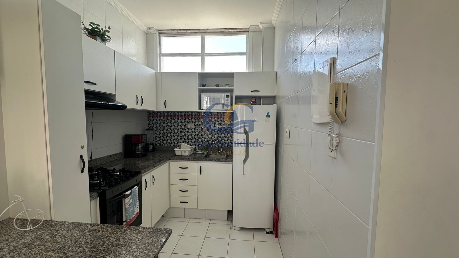 Apartamento na Praia das Pitangueiras, Guarujá - SP