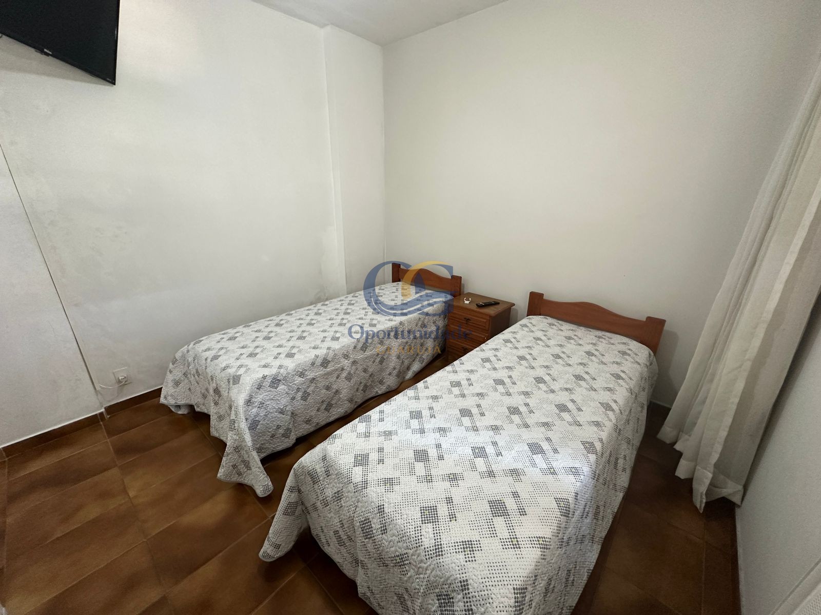 Apartamento na Praia das Pitangueiras, Guarujá - SP