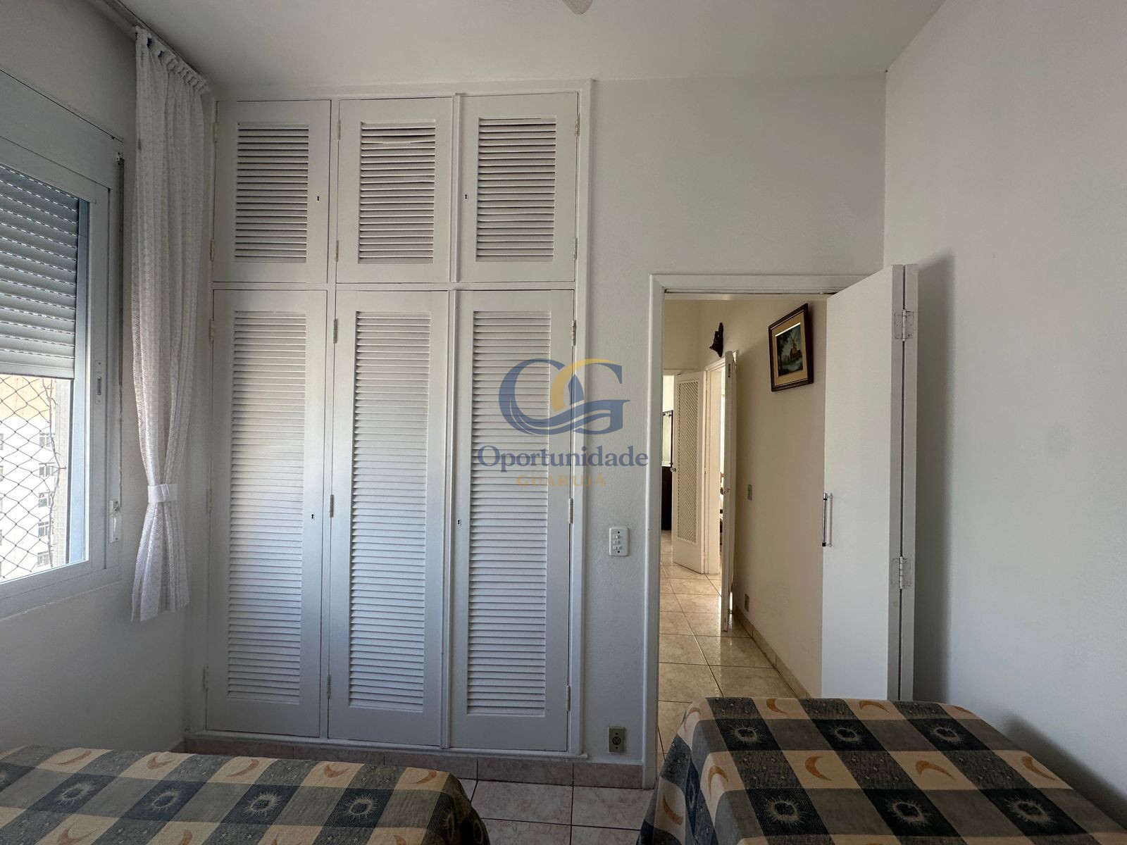 Apartamento na Praia das Pitangueiras, Guarujá - SP