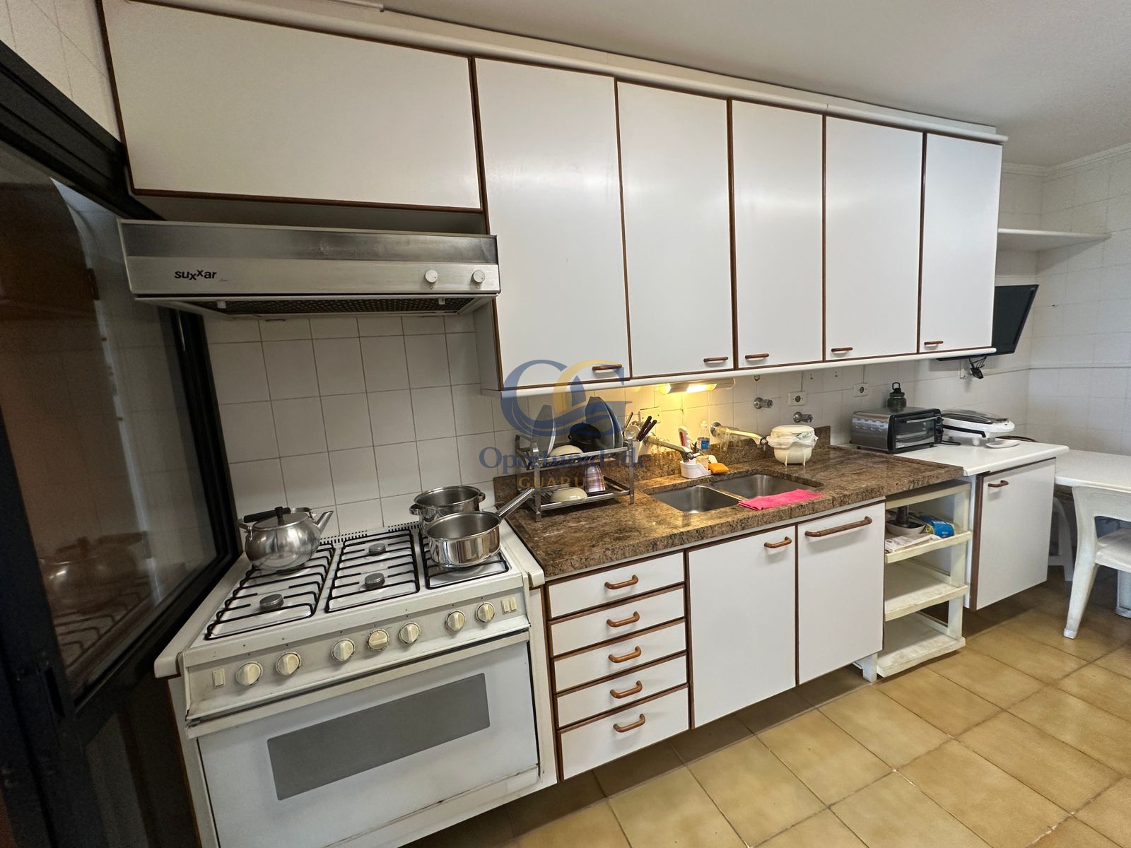 Apartamento na Praia das Pitangueiras, Guarujá - SP