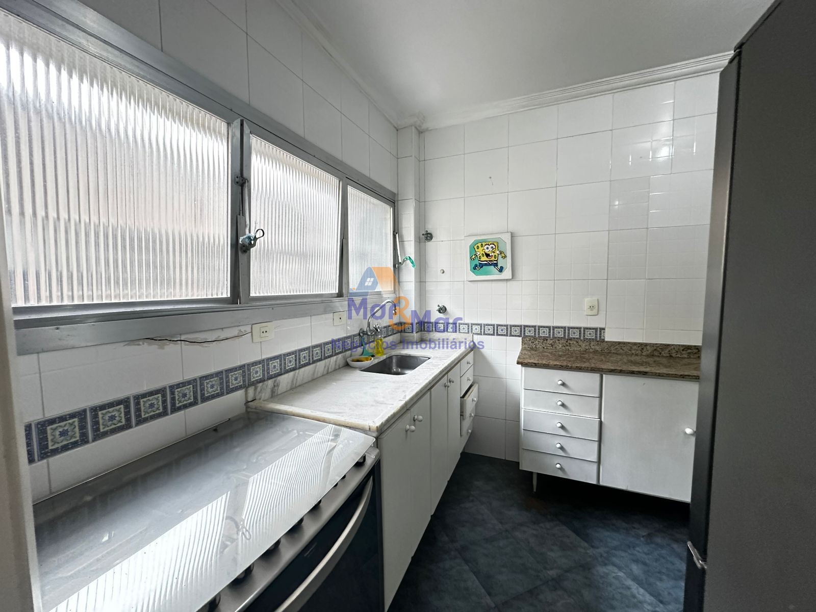 Apartamento na Praia das Pitangueiras, Guarujá - SP