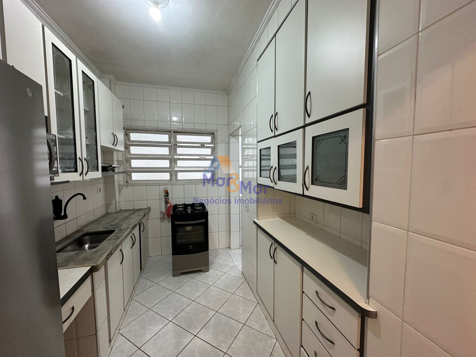 Apartamento na Praia das Pitangueiras, Guarujá - SP