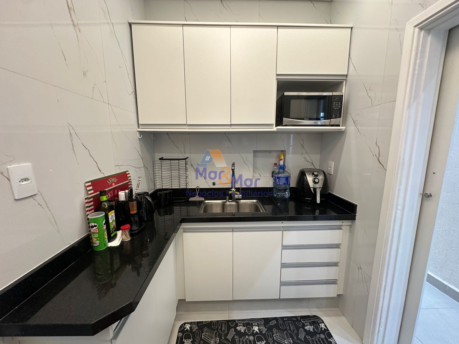 Apartamento na Praia das Pitangueiras, Guarujá - SP